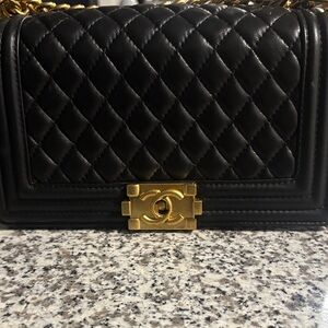 CHANEL Black Quilted Shoulder Bag with Gold Hardware